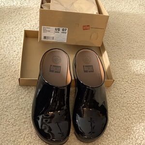 Fit Flop patent leather clogs